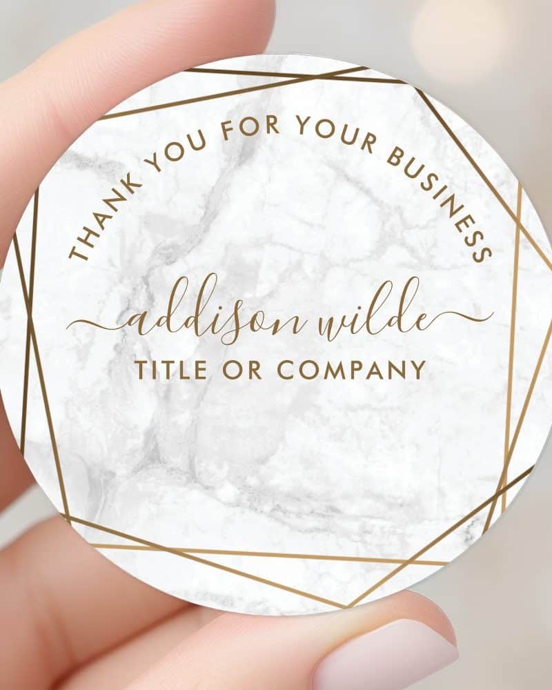 Round thank you sticker with marble texture, gold geometric border, and the name Addison Wilde.