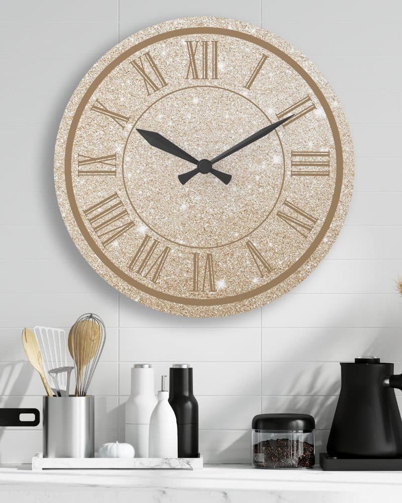 Gold glitter clock with Roman numerals.