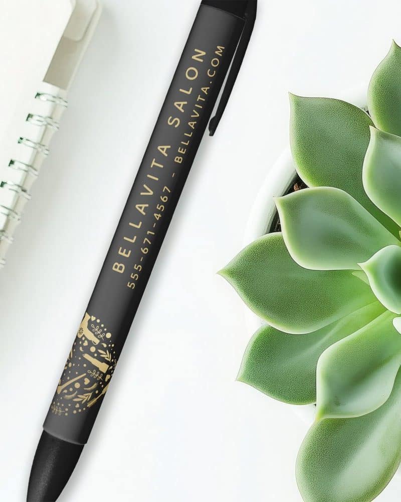 Black pen with gold Bella Vita Salon logo, phone number, and website address.