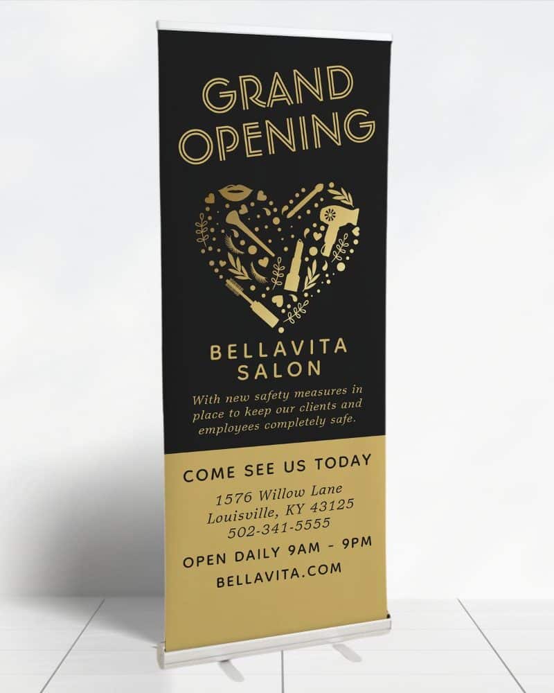 Grand opening retractable banner for Bellavita Salon, featuring a gold heart design with beauty product icons.