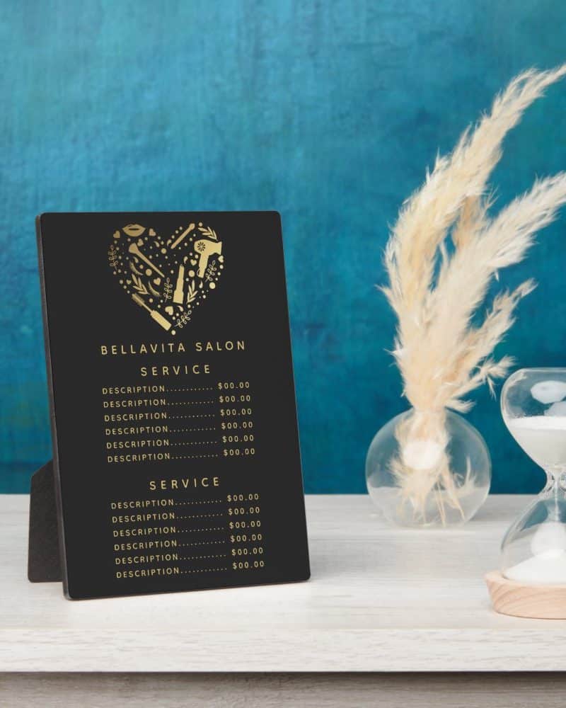 Black salon price list with gold heart logo and service descriptions.