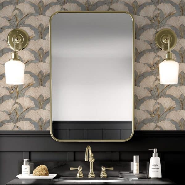 Brass Framed Mirror Above A Bathroom Sink With Gold Leaf Ginkgo Biloba Wallpaper.