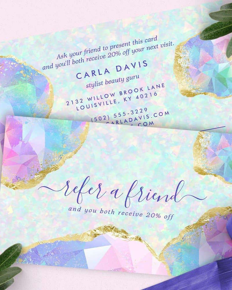 Referral card for Carla Davis, stylist, featuring pastel gemstone design.