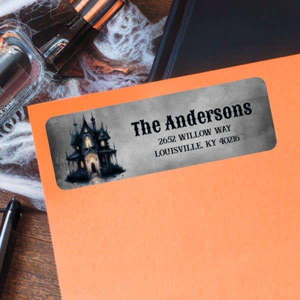 Halloween-Themed Return Address Label Featuring A Spooky House Illustration And The Address For The Andersons.