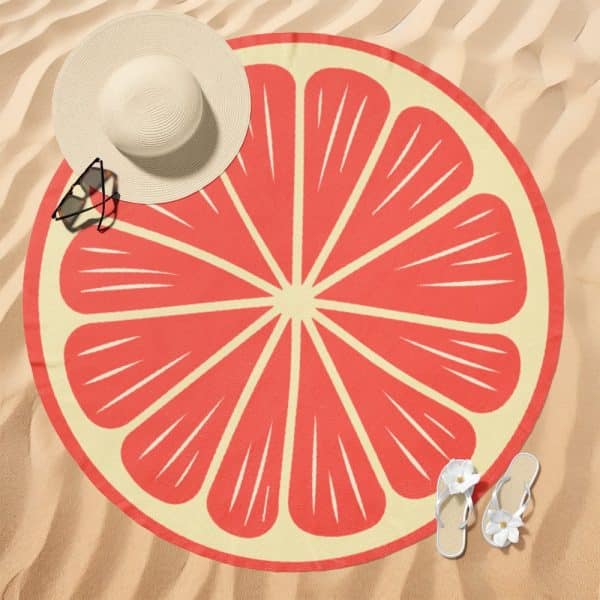 Round Beach Towel With A Grapefruit Design.