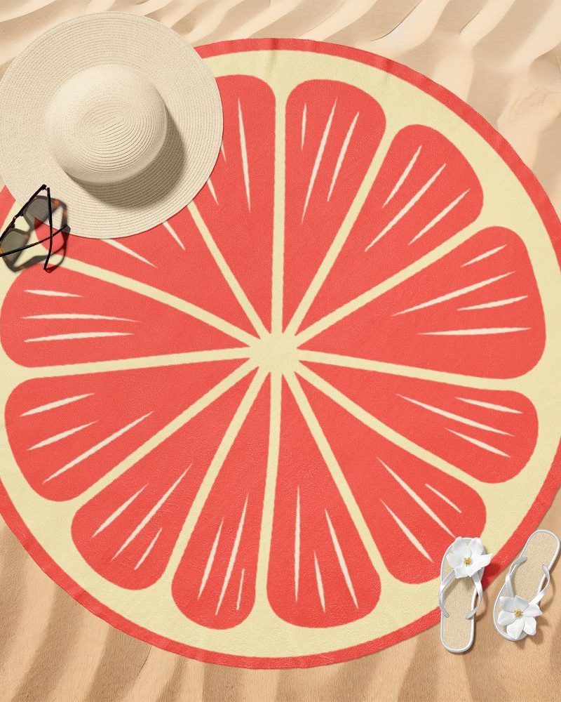 Round beach towel with a grapefruit design.
