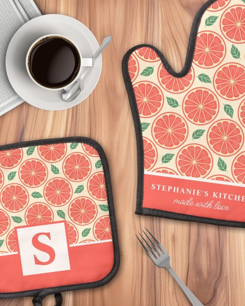 Personalized oven mitt and pot holder with a grapefruit pattern.