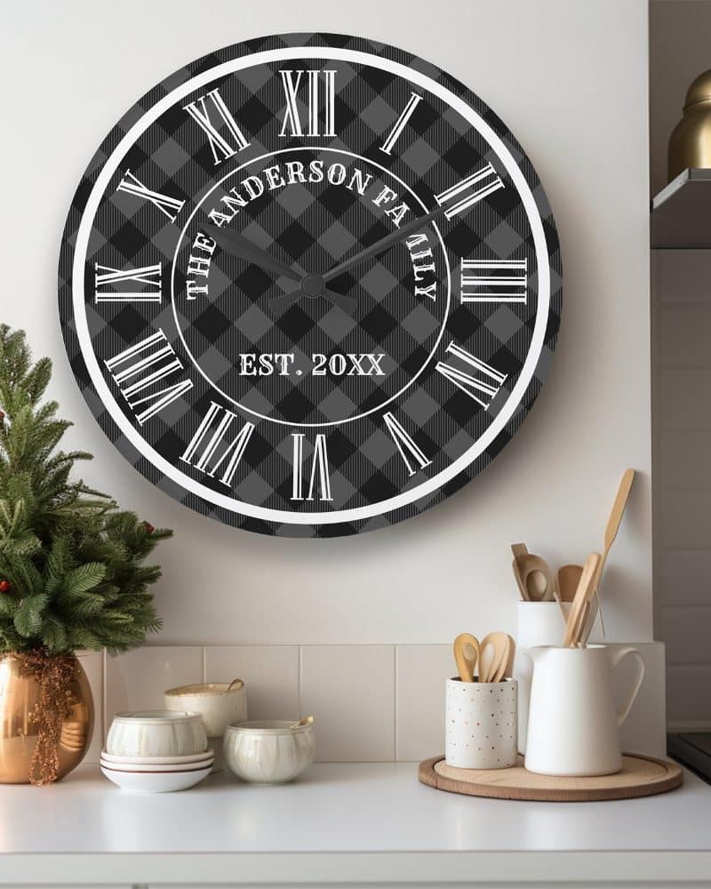 Black and white plaid wall clock with Roman numerals and personalized family name and establishment year.