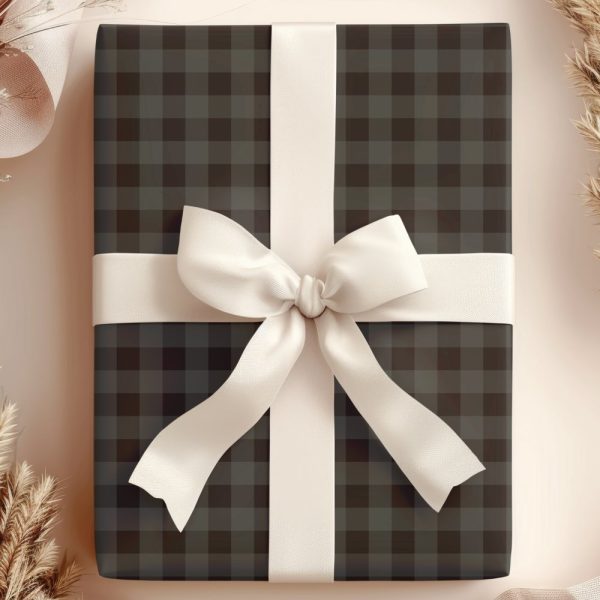 A Dark Gray And Black Plaid Gift Box With A Large Cream-Colored Bow.