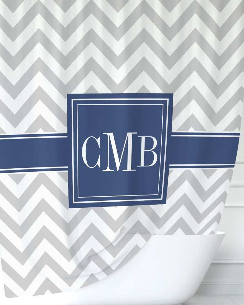 Gray and white chevron patterned shower curtain with navy blue monogram CMB.
