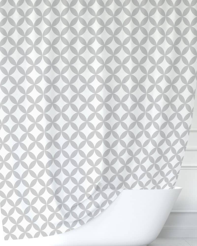 Grey and white geometric patterned shower curtain.