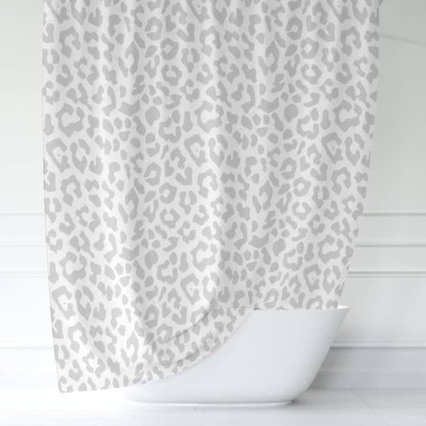 Grey And White Shower Curtain With A Leopard Print Pattern.