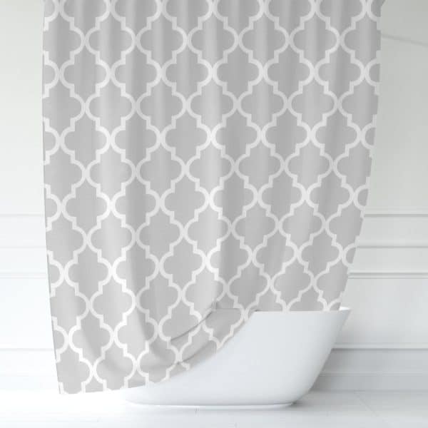 Gray Shower Curtain With A White Quatrefoil Pattern.