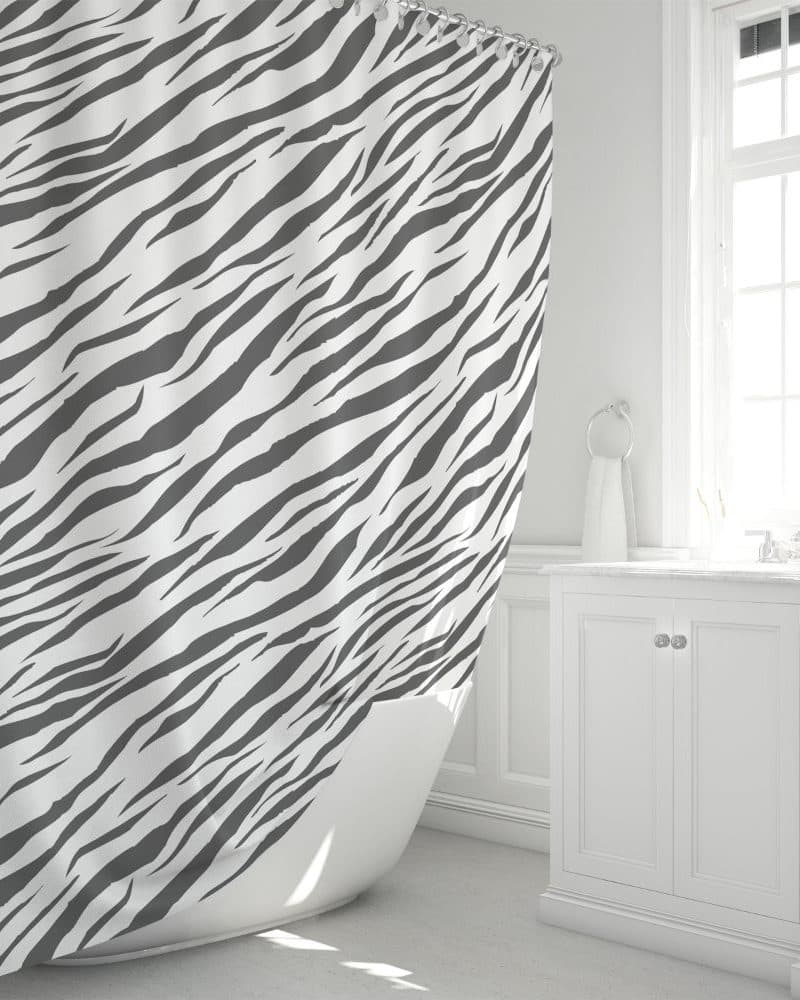 Gray and white zebra-striped shower curtain.