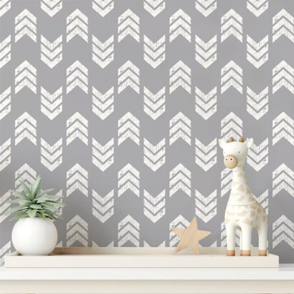 Gray Chevron Patterned Wall With A Small Giraffe Toy And A Succulent Plant On A Shelf.
