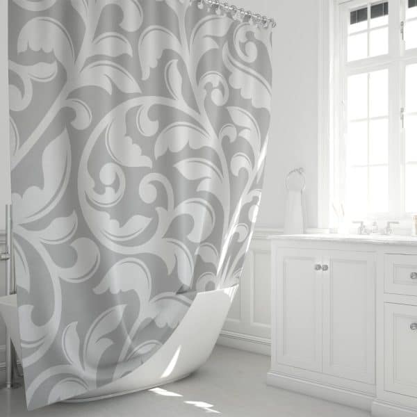 Gray Shower Curtain With A White Damask Pattern, Partially Draped Over A White Bathtub.