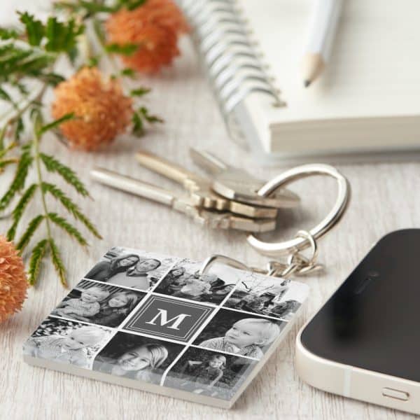 A Square Photo Keychain With Black And White Family Photos And A Central Monogram.