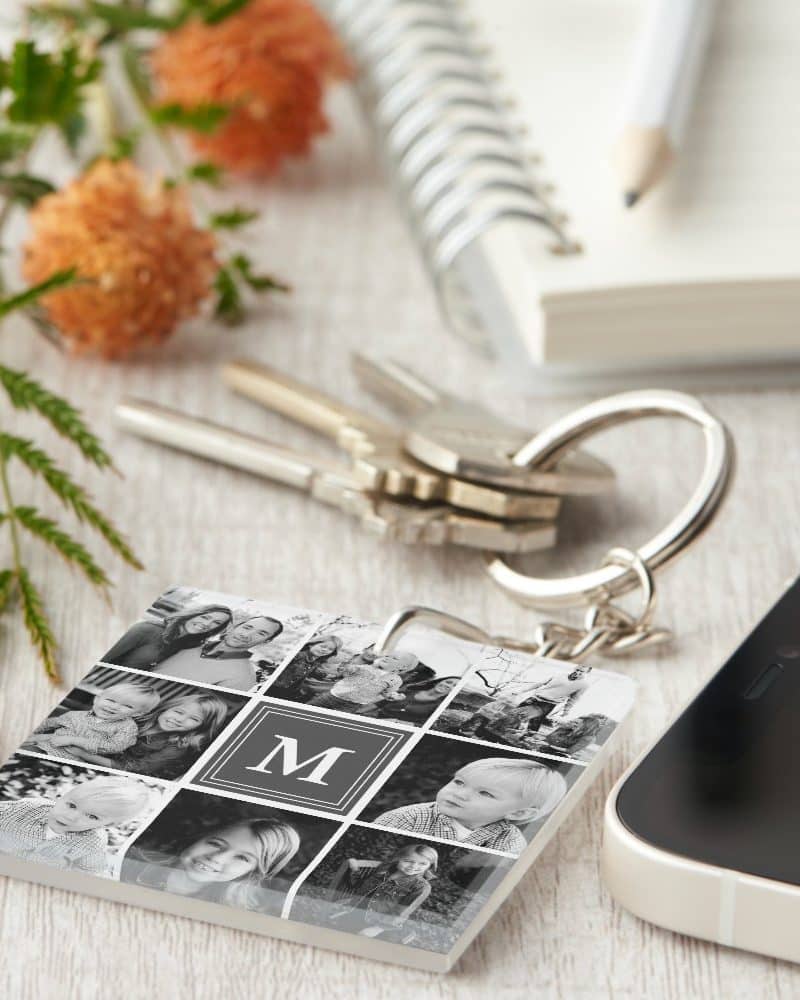 A square photo keychain with black and white family photos and a central monogram.