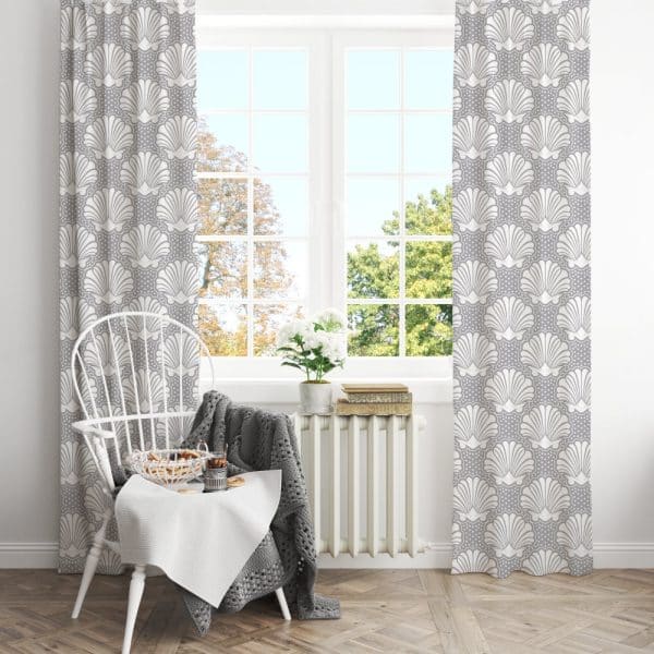 Gray Curtains With A White Seashell Pattern Hang In A Bright Window.
