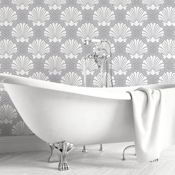 White Clawfoot Bathtub Against A Gray Seashell Patterned Wall.