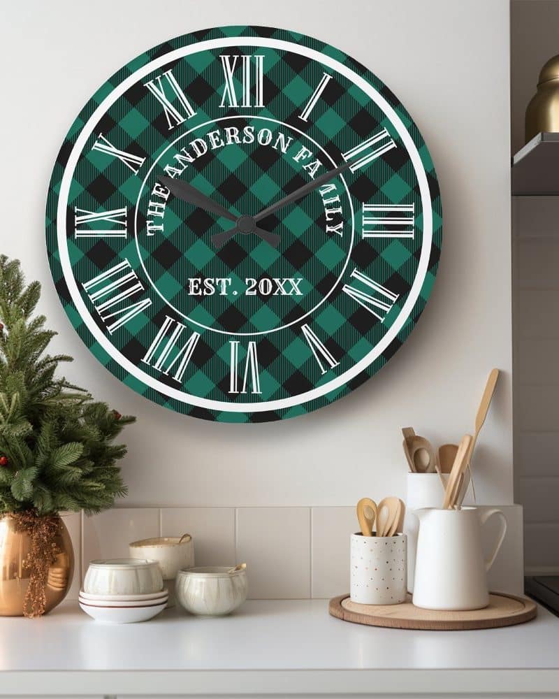 Green and black plaid round clock with Roman numerals and personalized family name and establishment year.