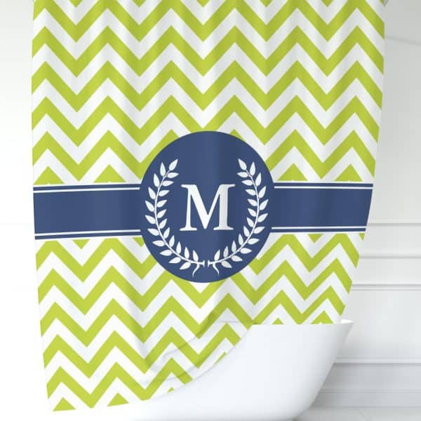 Lime Green Chevron Shower Curtain With A Navy Blue Circle Monogram Featuring The Letter M And Laurel Wreath.