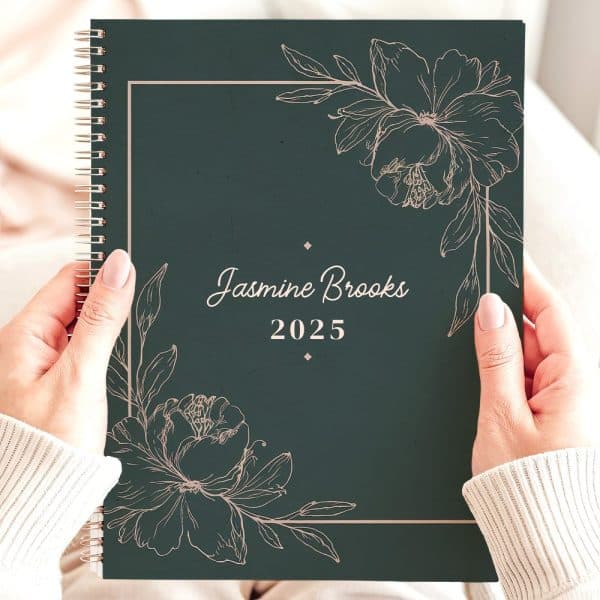 Dark Green 2025 Planner With Rose Gold Floral Design And Jasmine Brooks' Name.