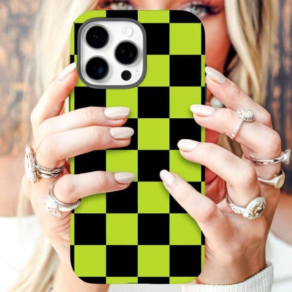 Close-Up Of Hands Holding A Lime Green And Black Checkered Iphone Case.