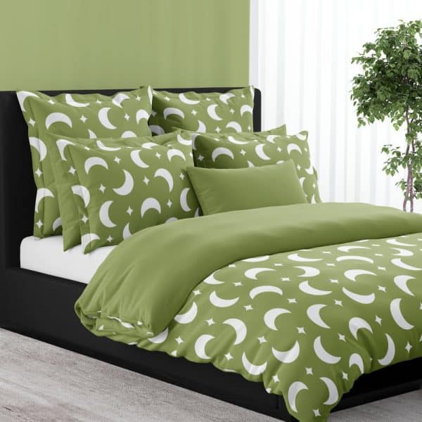 Olive Green Duvet Cover And Pillow Shams With A White Crescent Moon And Star Pattern.