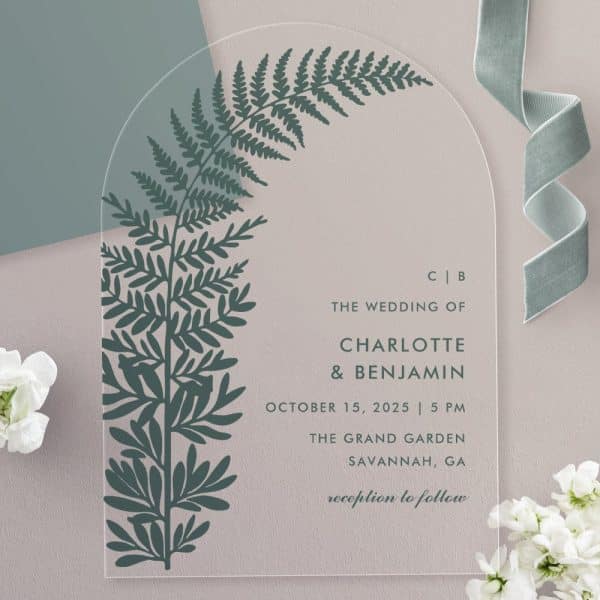 Clear Acrylic Wedding Invitation With Fern Illustration And Wedding Details For Charlotte And Benjamin.