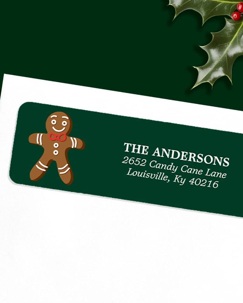 Dark green return address label with a gingerbread man and the Andersons' address.