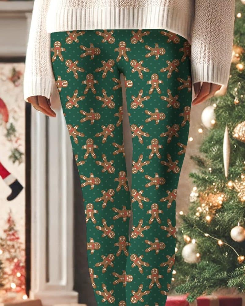 Green leggings with a repeating pattern of gingerbread men.