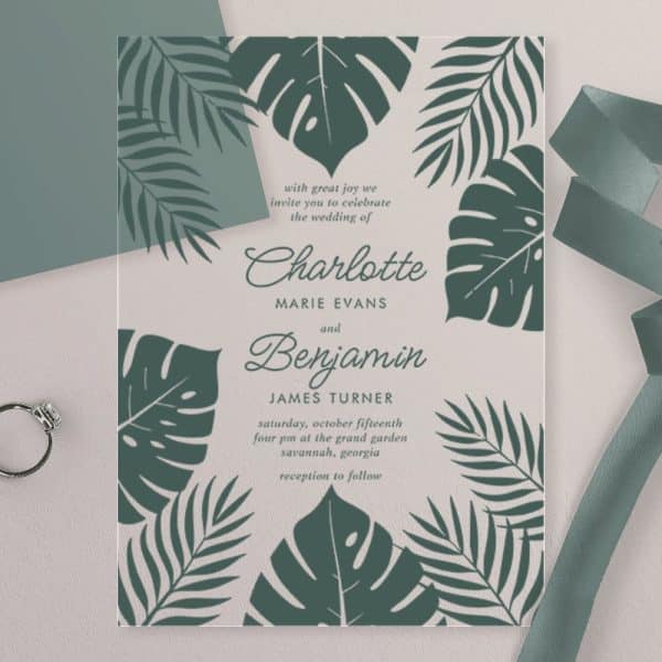 Wedding Invitation For Charlotte Evans And Benjamin Turner, Featuring A Tropical Leaf Design.