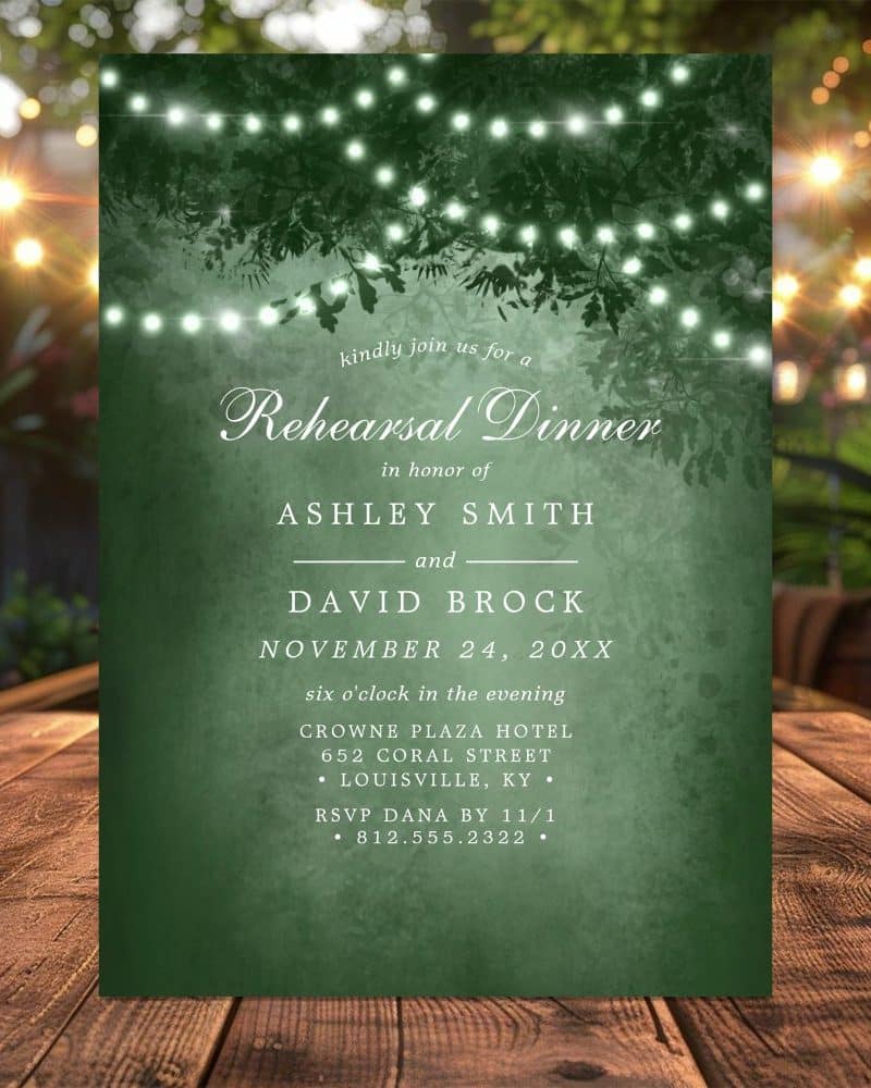 Green rehearsal dinner invitation with string lights and tree branches; Ashley Smith and David Brock.
