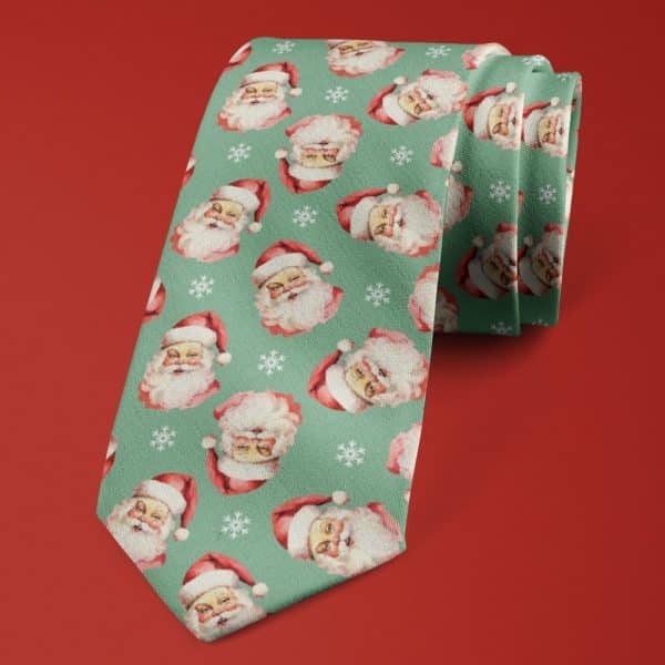 Teal Necktie With A Repeating Pattern Of Santa Claus Faces And Snowflakes.