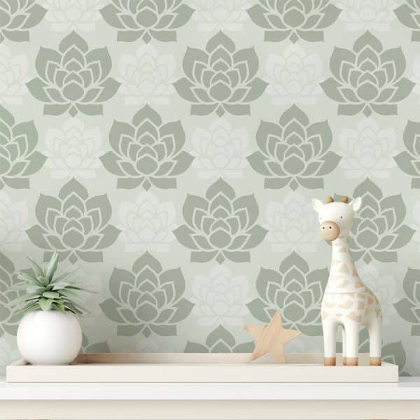 A White Wooden Shelf Holds A Small Potted Plant And A Giraffe Toy Against A Wall With A Sage Green Floral Wallpaper.