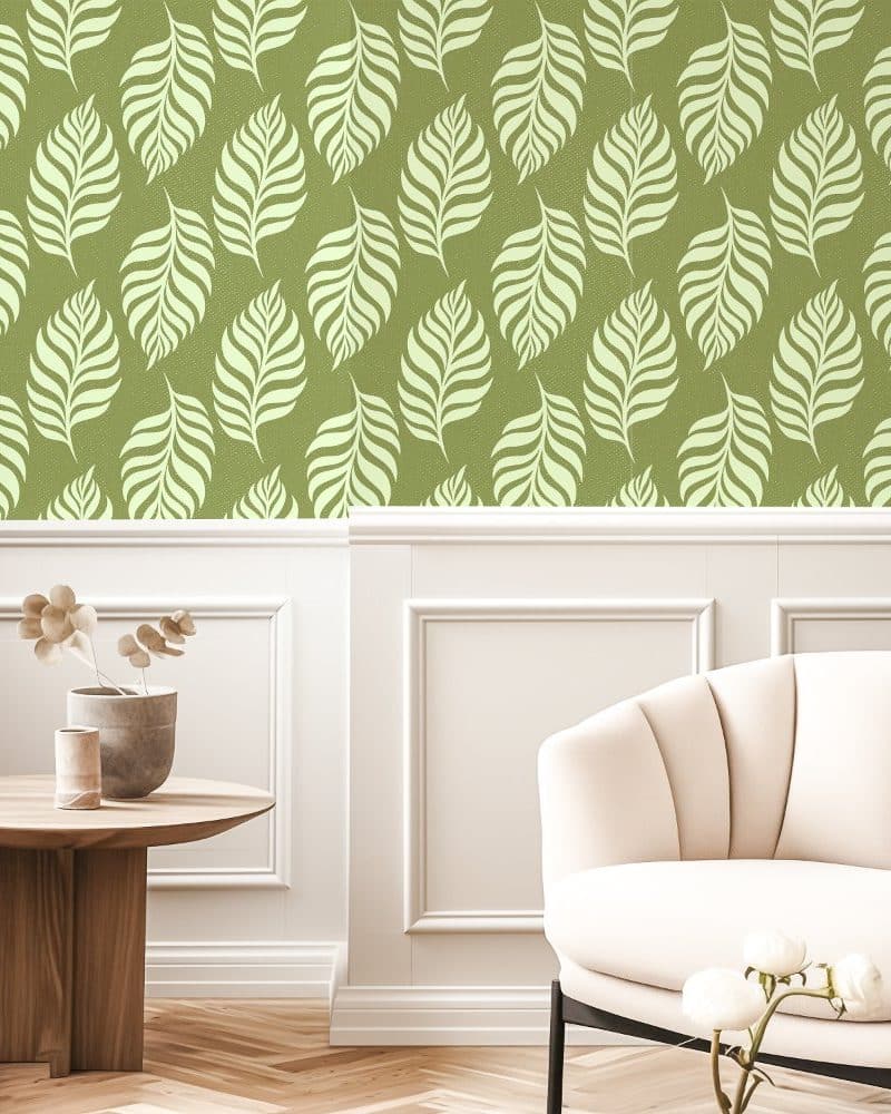 Olive green wallpaper with a repeating pattern of light beige stylized leaves.