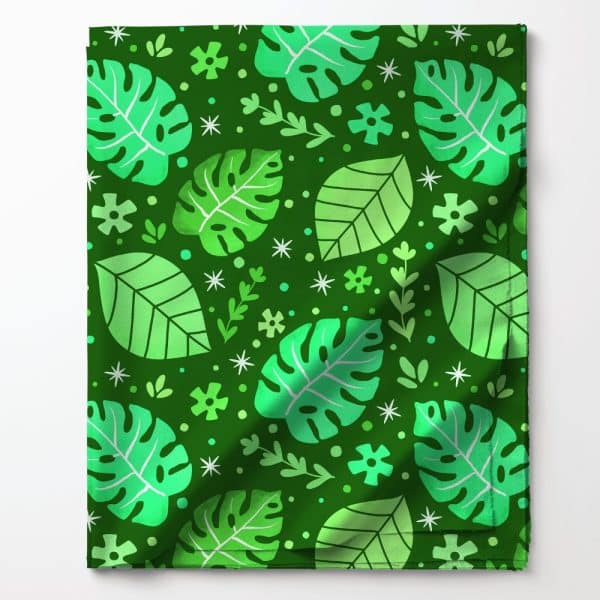 Green Fabric With A Repeating Pattern Of Monstera Leaves And Other Foliage.