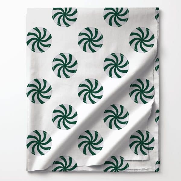 White Fabric With A Repeating Pattern Of Dark Green Peppermint Candies.