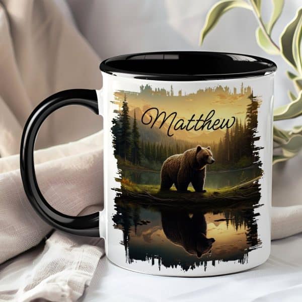 Personalized Coffee Mug With A Grizzly Bear Reflected In A Lake At Sunset. The Name Matthew Is Printed On The Mug.