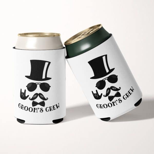 Two White Can Coolers Featuring A Black And White Illustration Of A Man In A Top Hat, Sunglasses, And Mustache; The Text Groom'S Crew Is Printed Below.