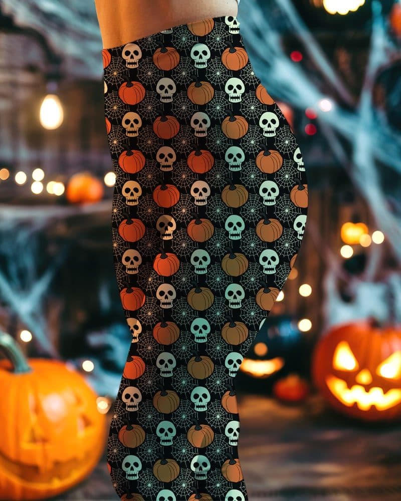 Halloween leggings with a repeating pattern of skulls and pumpkins.