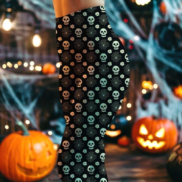 Black Leggings With A Halloween Pattern Of Skulls, Spiderwebs, And Flowers.