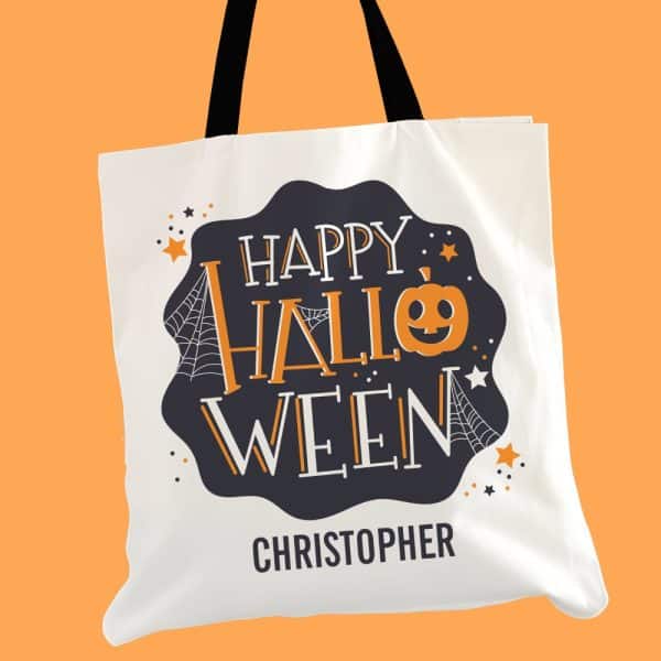 White Tote Bag With Black And Orange Halloween Design, Including The Name Christopher.