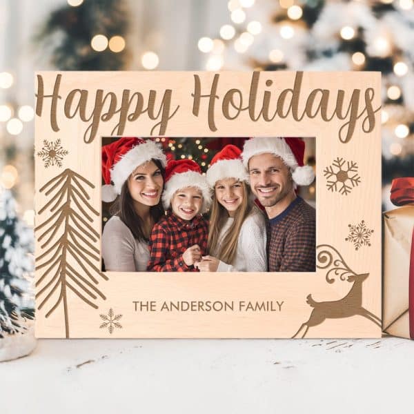 Wooden Christmas Photo Frame With The Words Happy Holidays, A Family Photo, And A Reindeer Design.