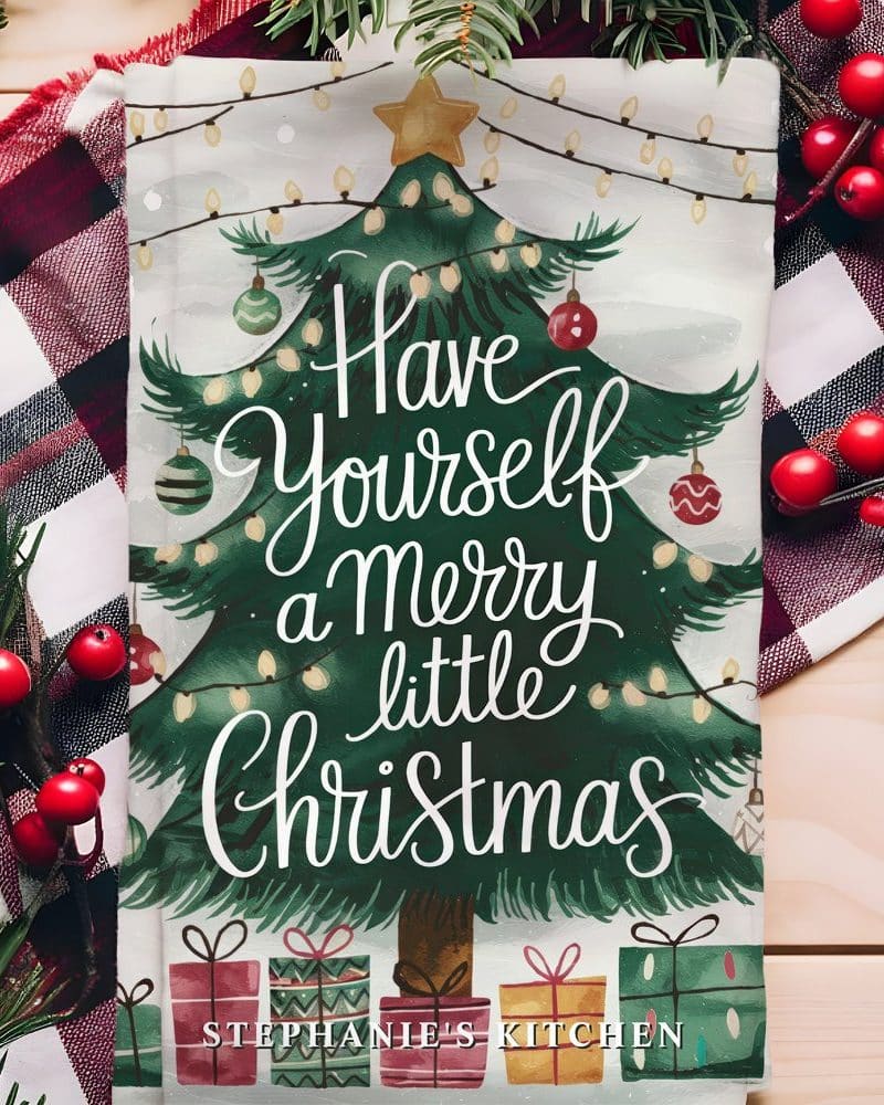 Christmas tea towel with illustrated Christmas tree and the text Have Yourself a Merry Little Christmas.