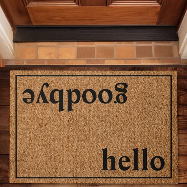 Tan Doormat With The Word Hello And A Backwards Spelling Of Hello.