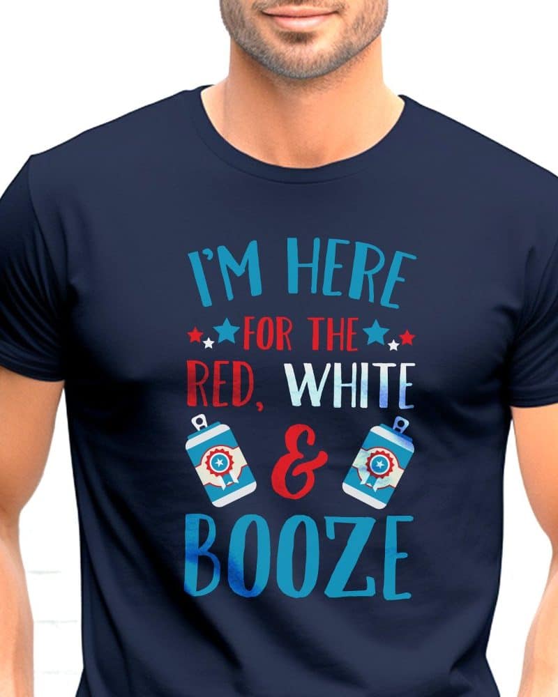 Man wearing a navy blue t-shirt that says, Im here for the red, white, and booze. Two beer cans are depicted next to the text.