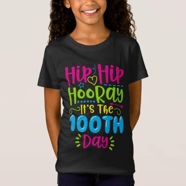 Girl Wearing A Black T-Shirt That Says Hip Hip Hooray It'S The 100Th Day In Colorful Lettering.