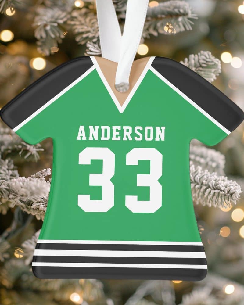 Green and black hockey jersey ornament with the name Anderson and number 33.
